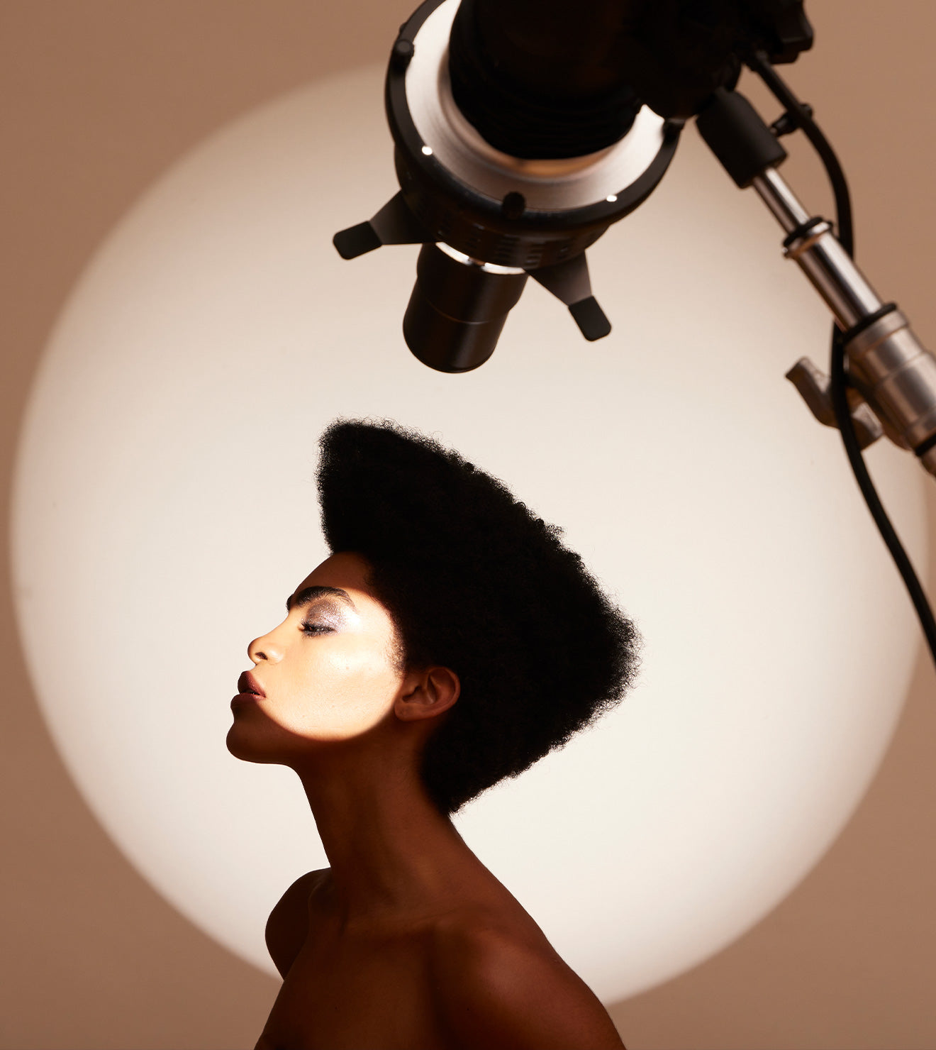 Optical Spot By Lindsay Adler Used For Studio Portrait 