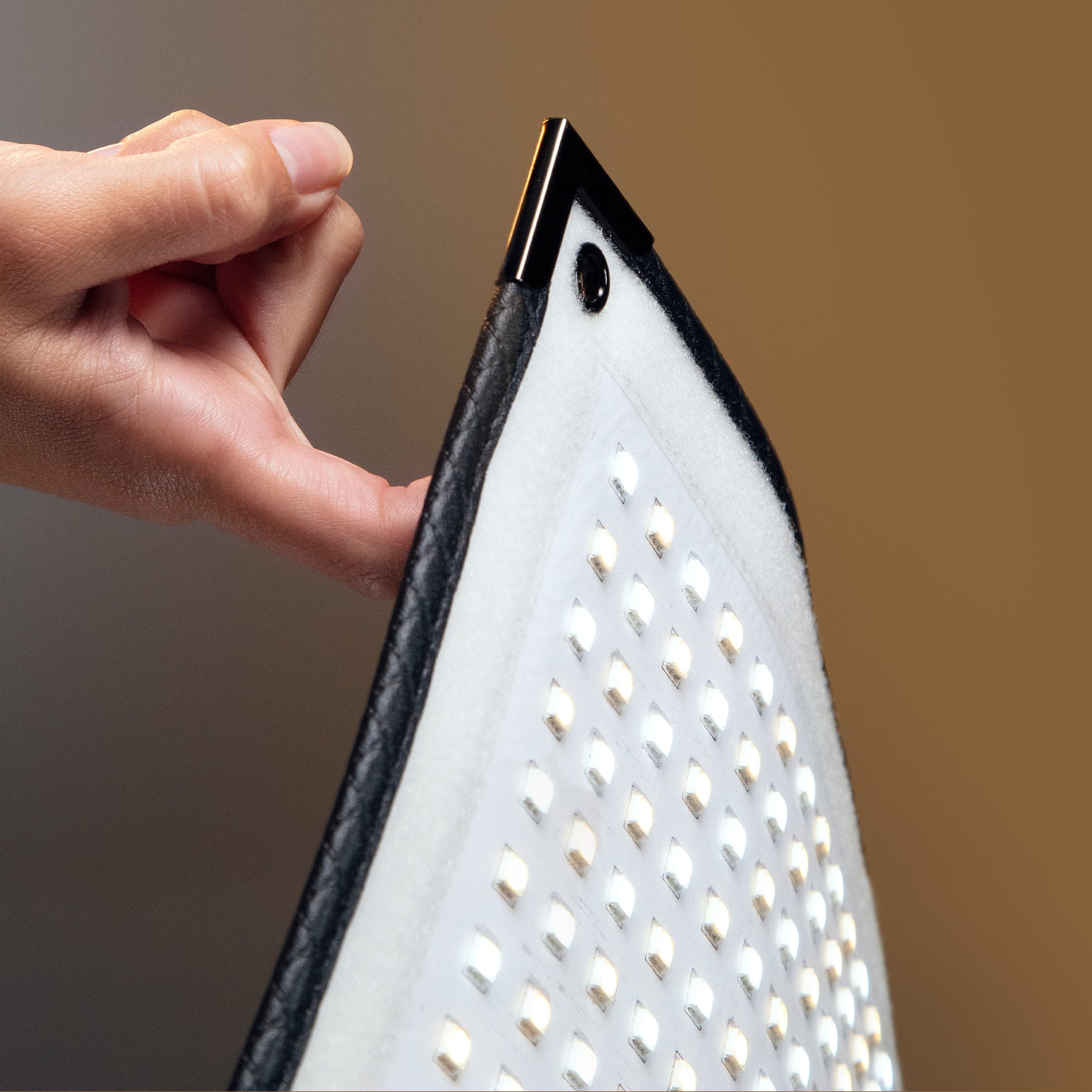 Flex Cine Mat Being Held with 1 Finger