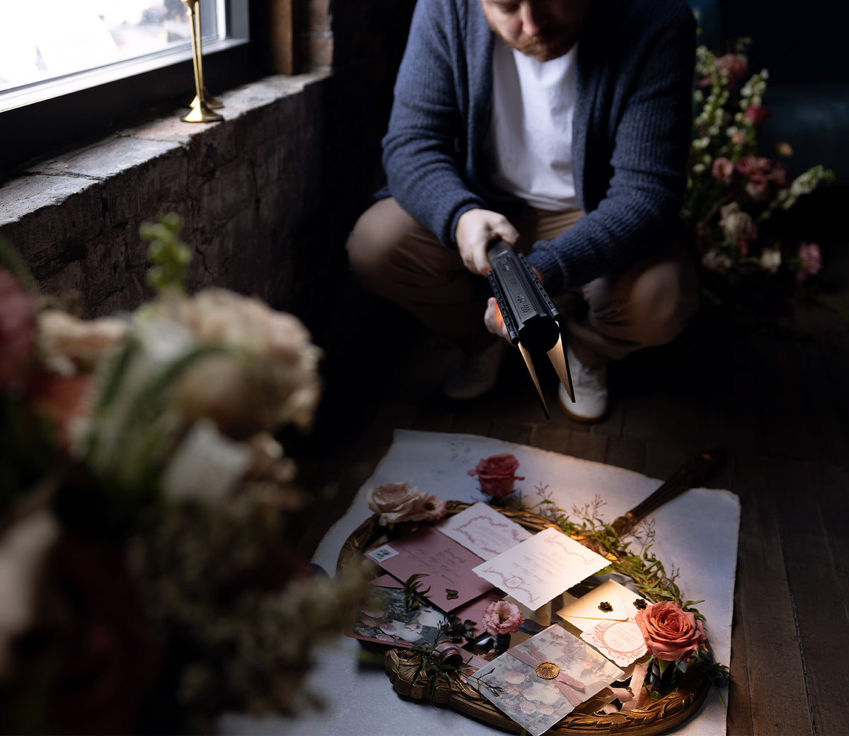 Dramatic Lighting on Wedding Literature wit Ice Light 3 Barndoors